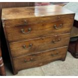 A George III mahogany chest of drawers, with brushing slide