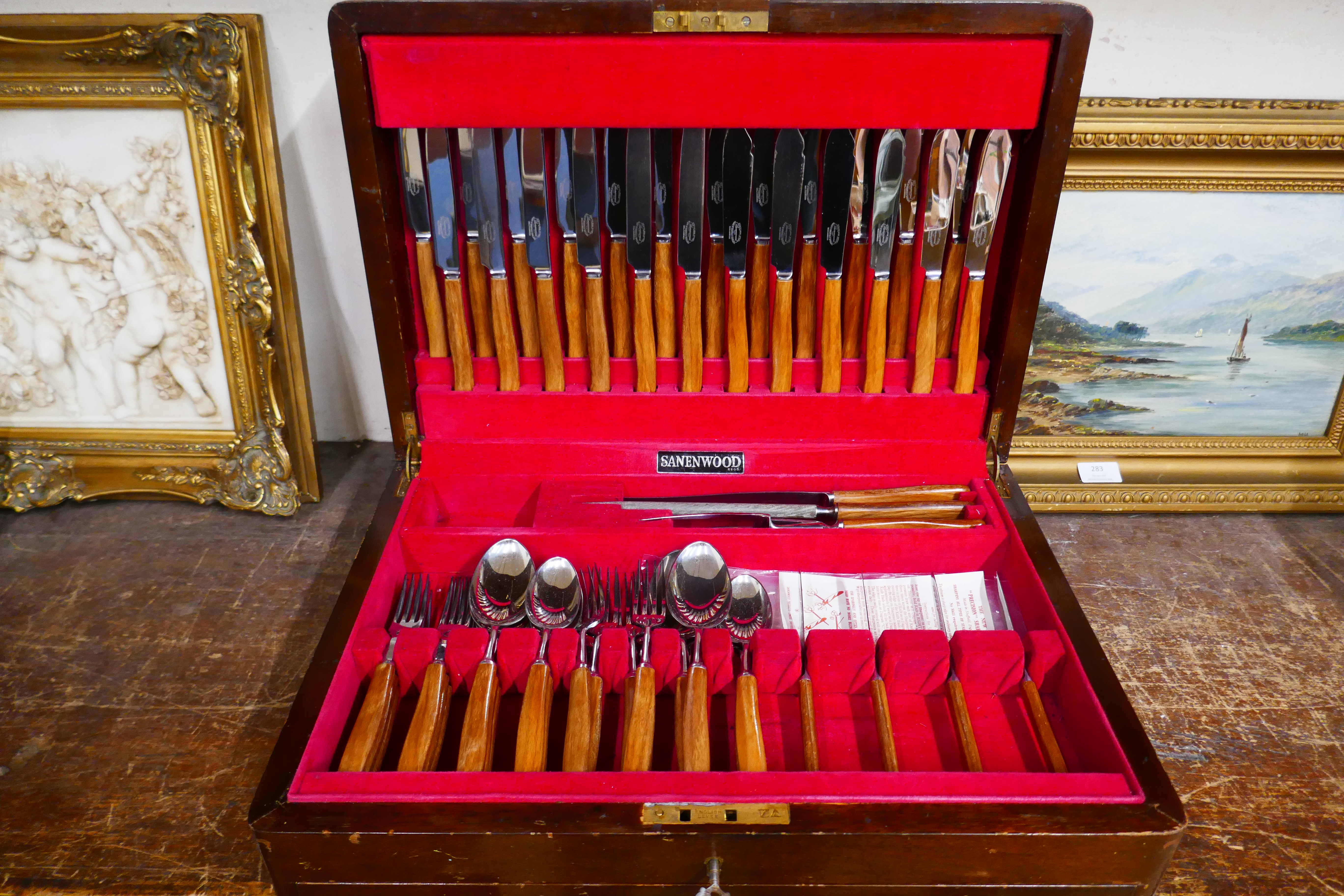 A cased Sanenwood canteen of cutlery