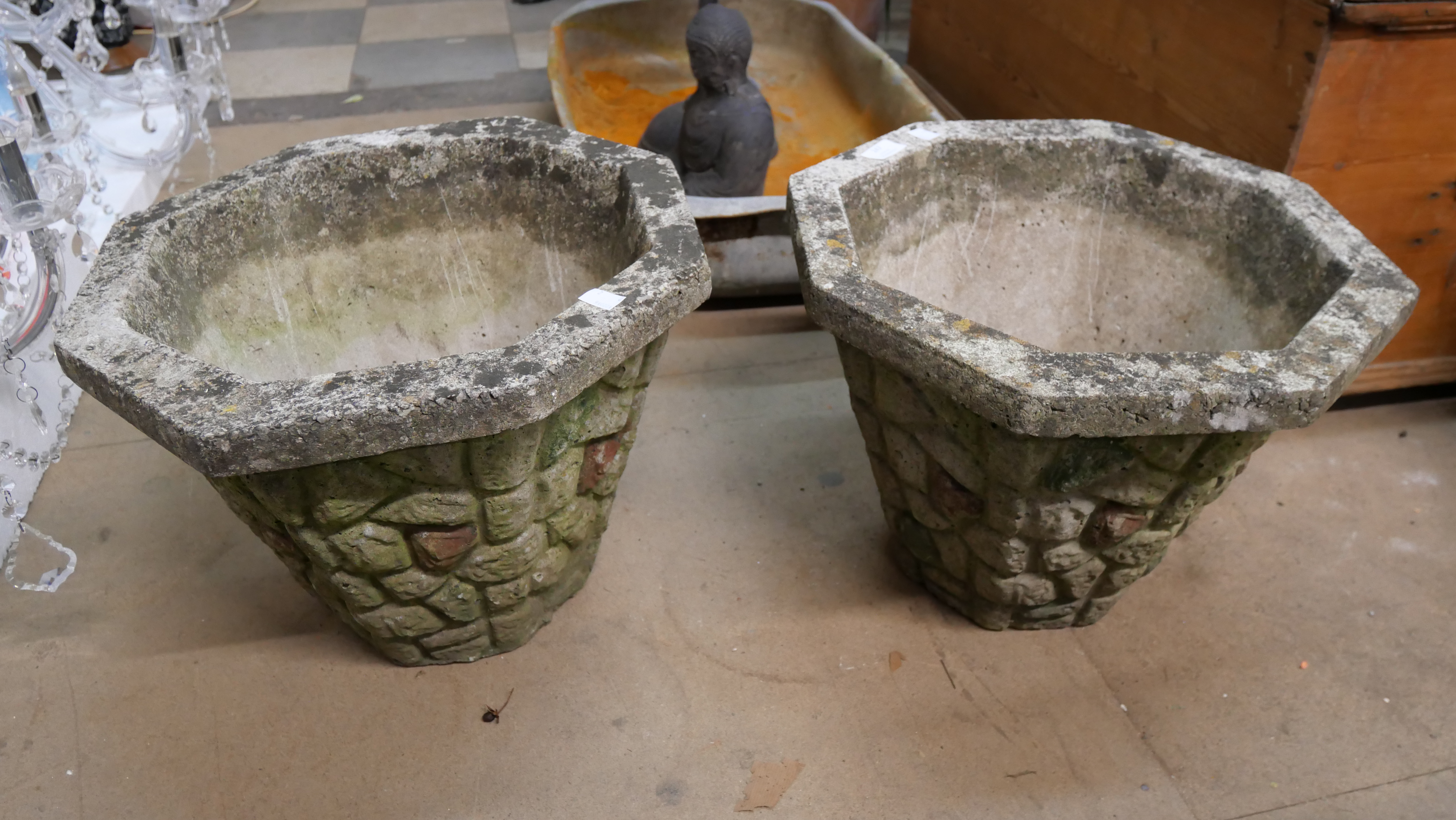 A pair of concrete planters