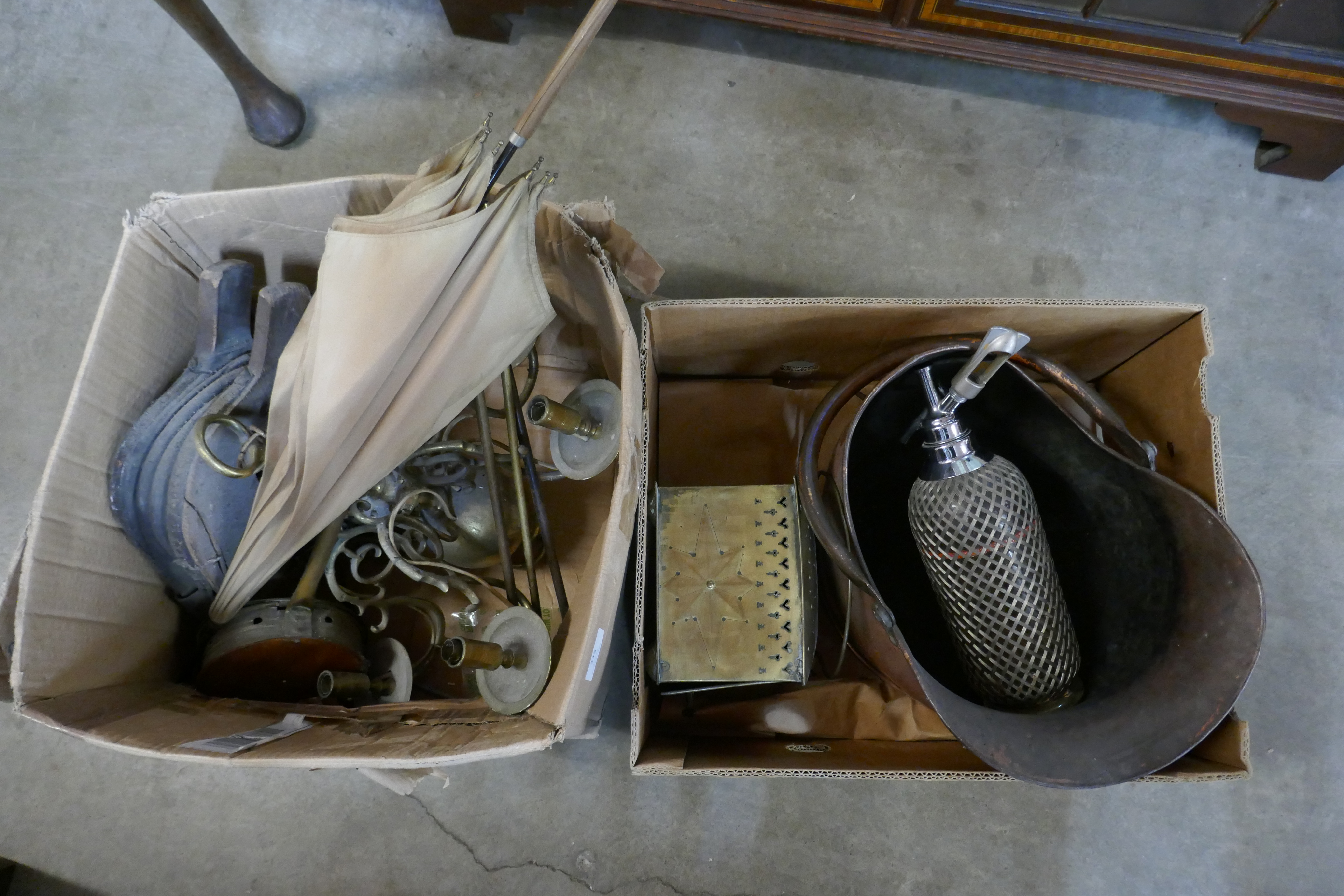 A lady's vintage umbrella, a coal scuttle and a vintage soda syphon, etc.