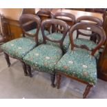 A Harlequin set of six Victorian mahogany balloon back dining chairs