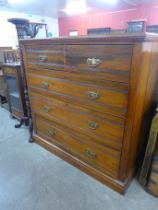 A Victorian walnut chest of drawers