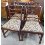 A set of four Chippendale style mahogany dining chairs