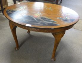 An Oriental painted mahogany coffee table
