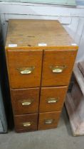 An oak index drawer cabinet