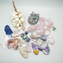 A collection of stone jewellery and unmounted stones