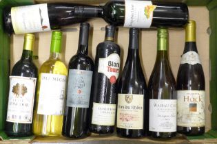 Nine bottles of red and white wine including Sauvignon Blanc, Cotes du Rhone, Black Tower, etc.