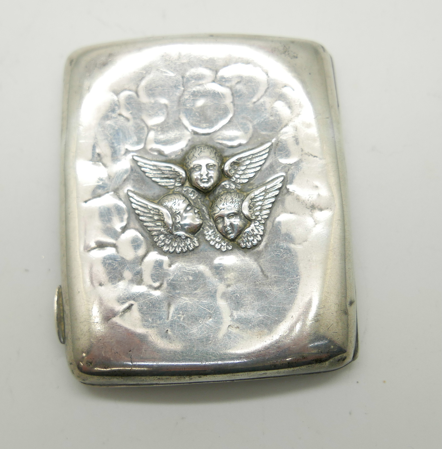 A silver cigarette case, Reynolds Angels detail, a/f, 72g - Image 2 of 7