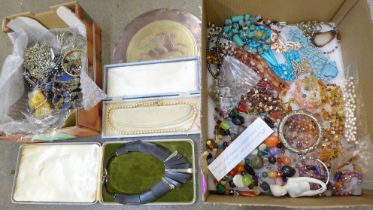 Two boxes of costume jewellery; semi-precious stone necklaces, Indian jewellery, brass and copper