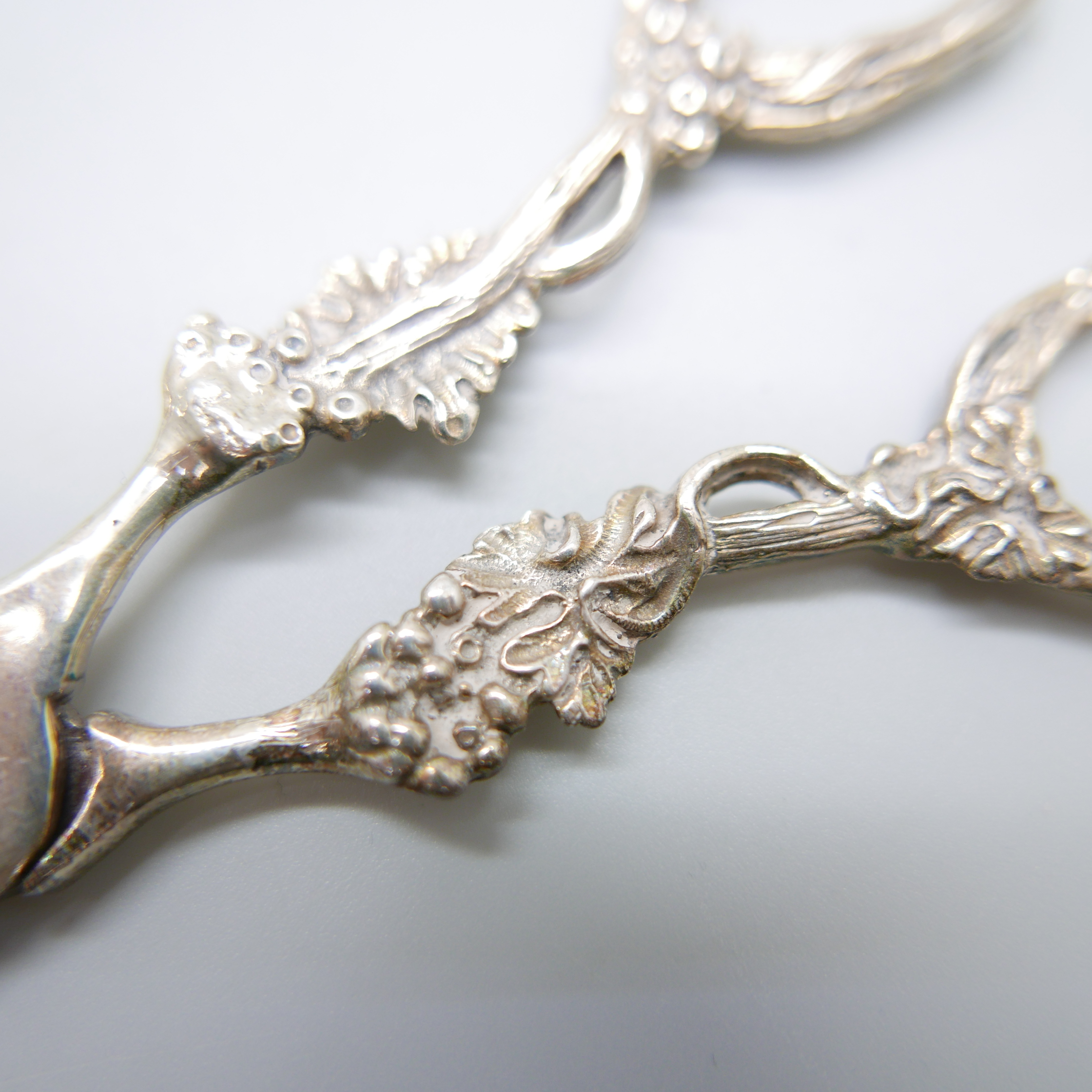 A Victorian silver spoon by George Adams, a strainer and a pair of silver grape scissors, (spoon and - Image 6 of 6