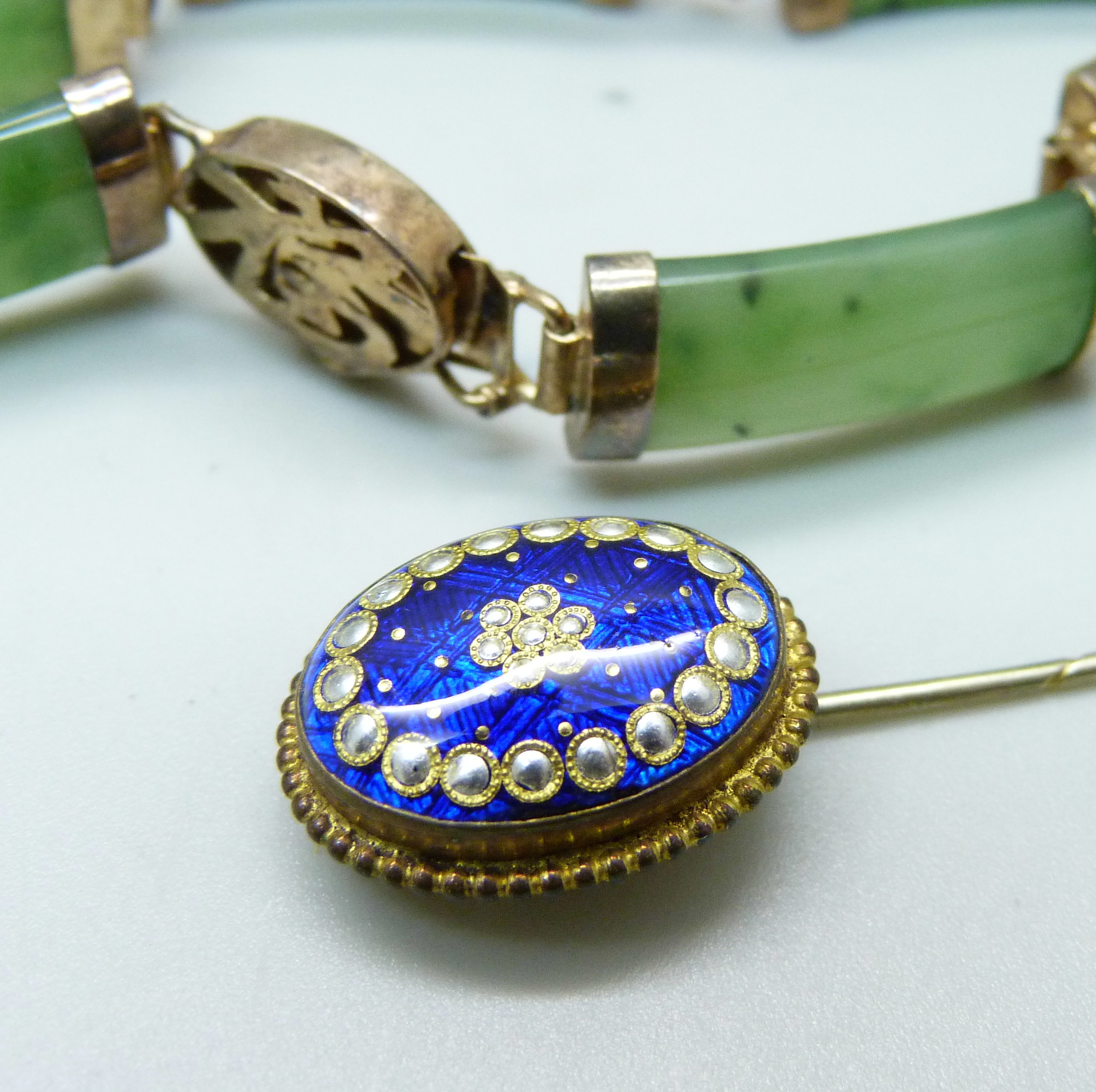 A silver set jade bracelet, two jade set brooches and an enamelled pin - Image 6 of 7