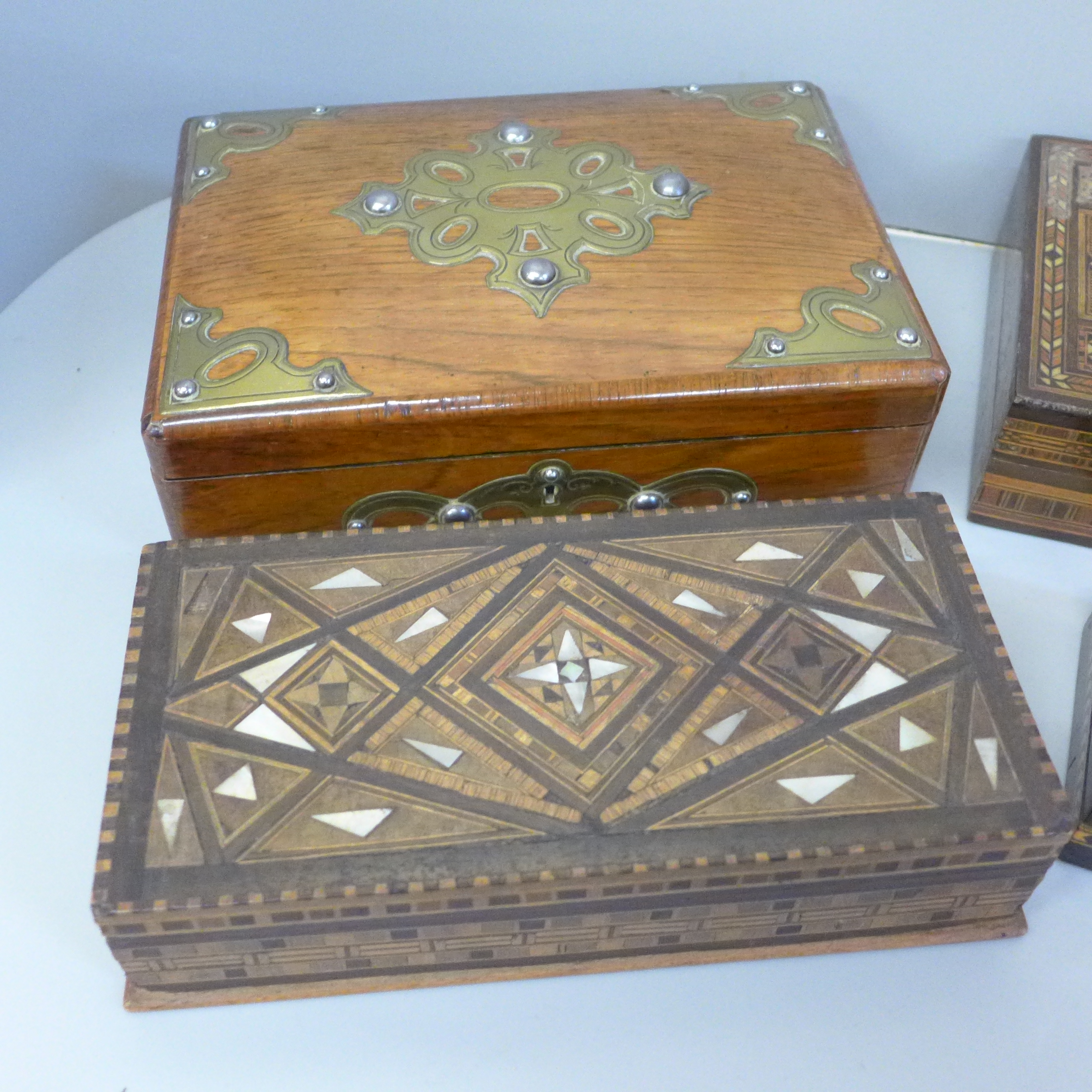 Six boxes; three inlaid wooden boxes, an oriental carved wooden box, a metal inlaid box and one - Image 2 of 5