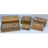 Six boxes; three inlaid wooden boxes, an oriental carved wooden box, a metal inlaid box and one