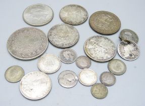 A collection of coins; three 1960's Canada one dollar, India half and one rupee, 1937 crown, 1925 US