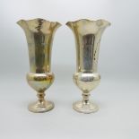 A pair of silver vases, by William Comyns, 15cm, weighted