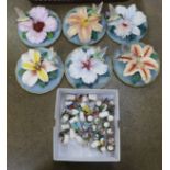 A set of six Bradex Fragile Beauty plates, a collection of thimbles with butterflies, a set of eight