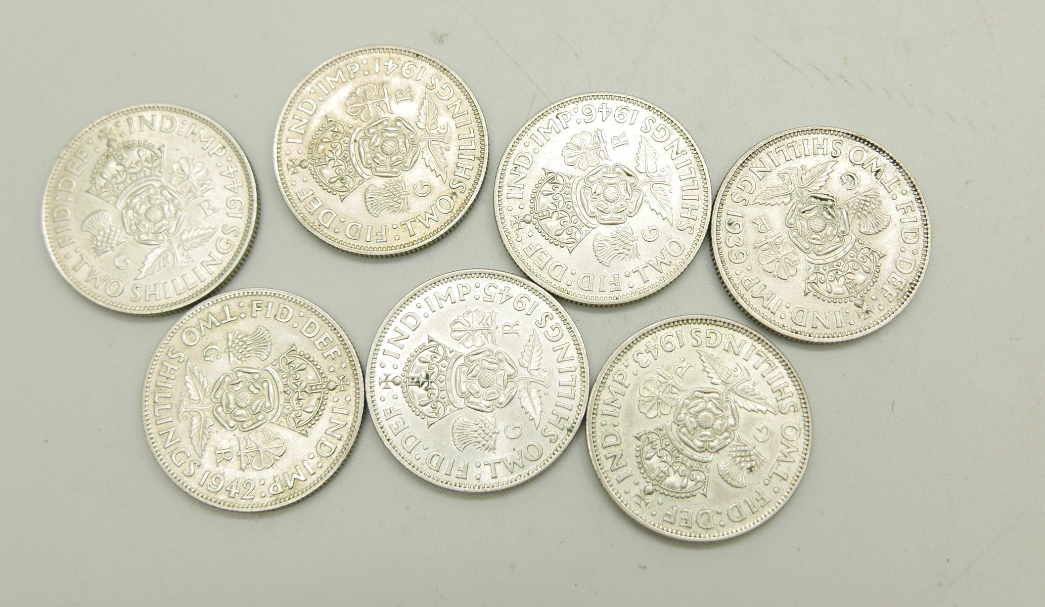 Seven silver florins, 1939 and 1941-1946 inclusive, 79.3g - Image 2 of 2