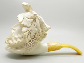 A large carved Meerschaum pipe of a Greek God, cased