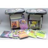 Over 700 Pokemon cards in tins, with holos (two tins)