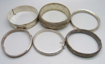 Five silver bangles, 83g, and one other bangle