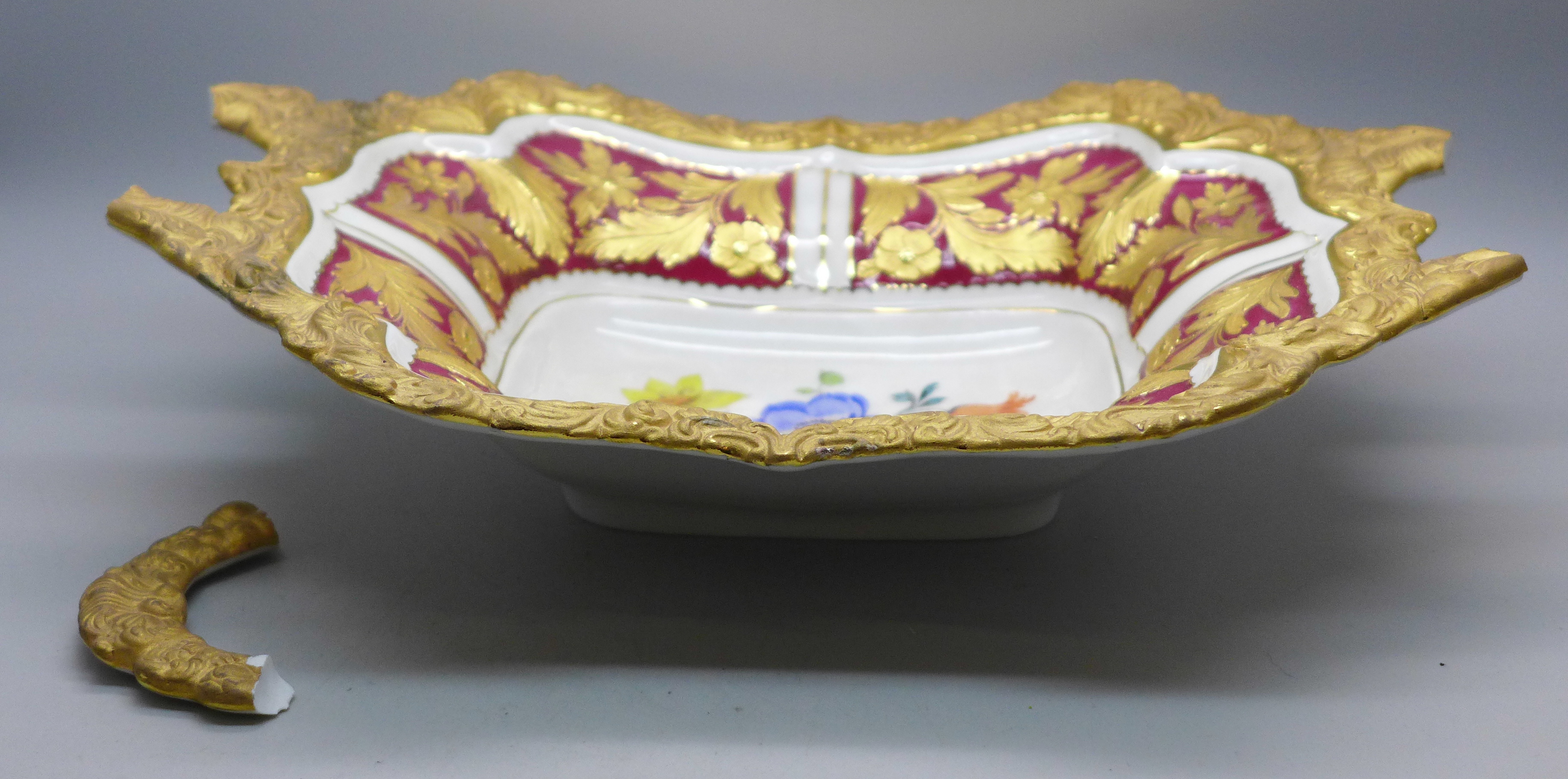 A Meissen ceremonial centrepiece/bowl, rectangular shape, heavily gilded, handles broken and only
