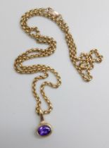 A 9ct gold and amethyst pendant and chain, 8.2g, chain 39cm, boxed