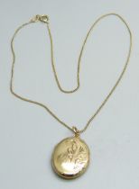 A 9ct gold locket and chain, 3.6g, chain 36cm
