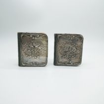 A Hymn book and a Prayer book, both with silver covers and Reynolds Angels detail