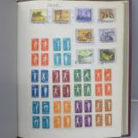 Stamps; an album of mint and used China stamps including full mint set of gymnasts in blocks of four