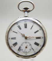 A pocket watch, tests as silver