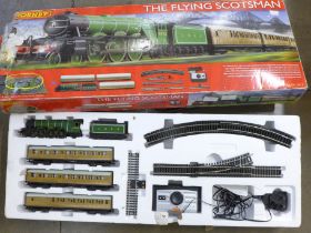 A Hornby The Flying Scotsman OO gauge train set, track payout and box a/f (damp deterioration)