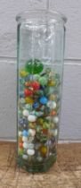 A jar of marbles **PLEASE NOTE THIS LOT IS NOT ELIGIBLE FOR IN-HOUSE POSTING AND PACKING**