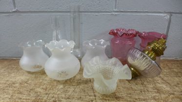 A collection of six light shades, an oil lamp reservoir and two funnels **PLEASE NOTE THIS LOT IS