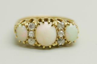 An 18ct gold, three opal and diamond ring, 3.2g, L