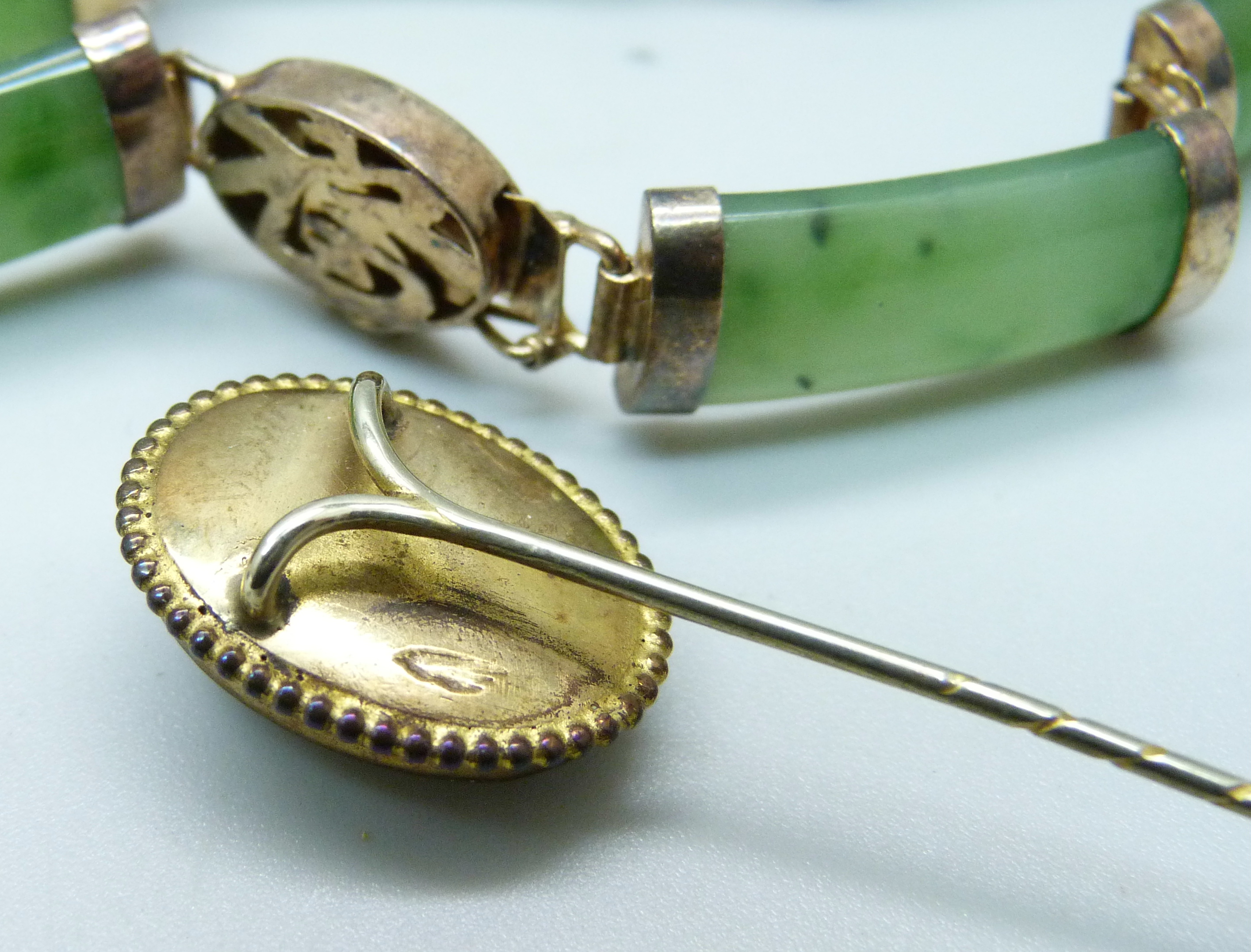 A silver set jade bracelet, two jade set brooches and an enamelled pin - Image 7 of 7