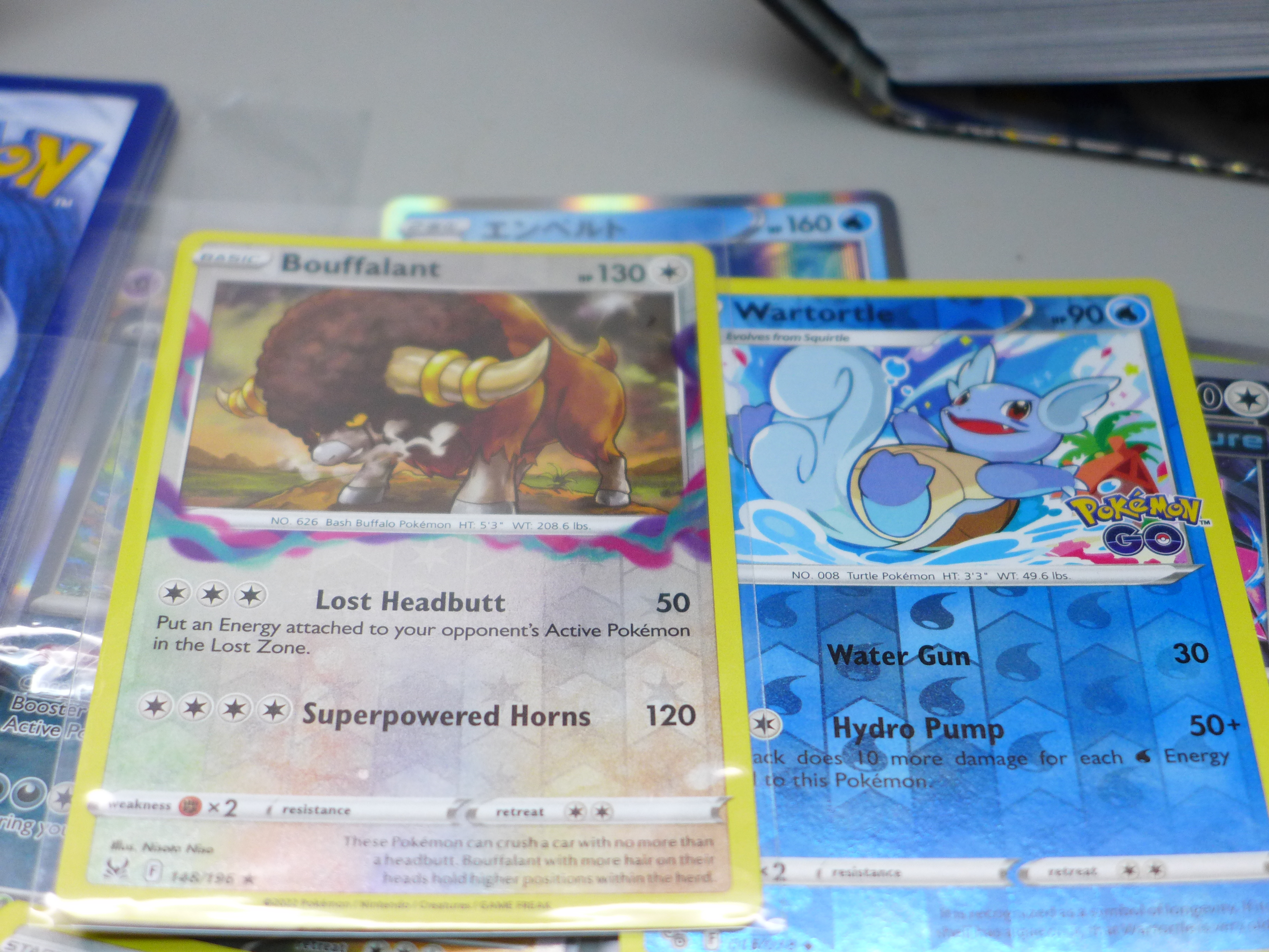 Over 700 Pokemon cards in tins, with holos (two tins) - Image 4 of 4