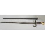 A French gras bayonet with scabbard, marked St. Ettienne 1875