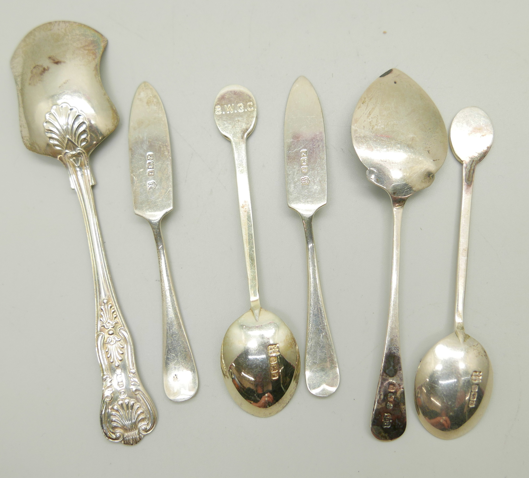 A pair of silver butter knives, a pair of silver golf club spoons and two silver preserve spoons, - Image 3 of 4