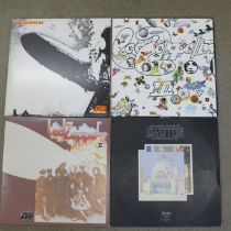 Four Led Zeppelin LP records; three re-issues comprising two tri-fold and a double and soundtrack,
