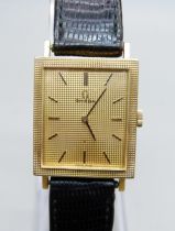 A gentleman's 18ct gold cased Omega dress wristwatch on a leather watch strap with Omega buckle,