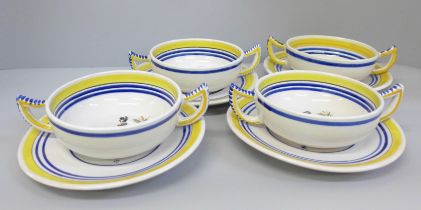A set of four early Quimper soup bowls and saucers, Henriot Quimper