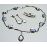 A opal set silver brooch, a pair of opal and silver drop earrings and a silver, marcasite and opal