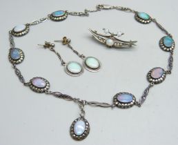 A opal set silver brooch, a pair of opal and silver drop earrings and a silver, marcasite and opal