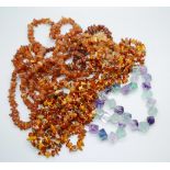 Four Baltic amber necklaces and a fluorite necklet