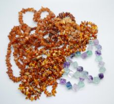 Four Baltic amber necklaces and a fluorite necklet