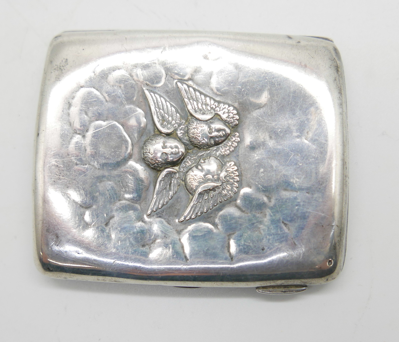 A silver cigarette case, Reynolds Angels detail, a/f, 72g