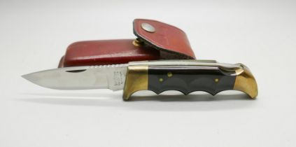 A Kershaw Oregon USA 1050 hunting knife by Kai Japan, with leather case