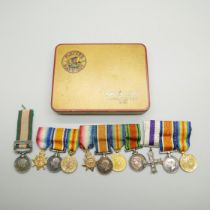 Three miniature medal groups and an India miniature medal