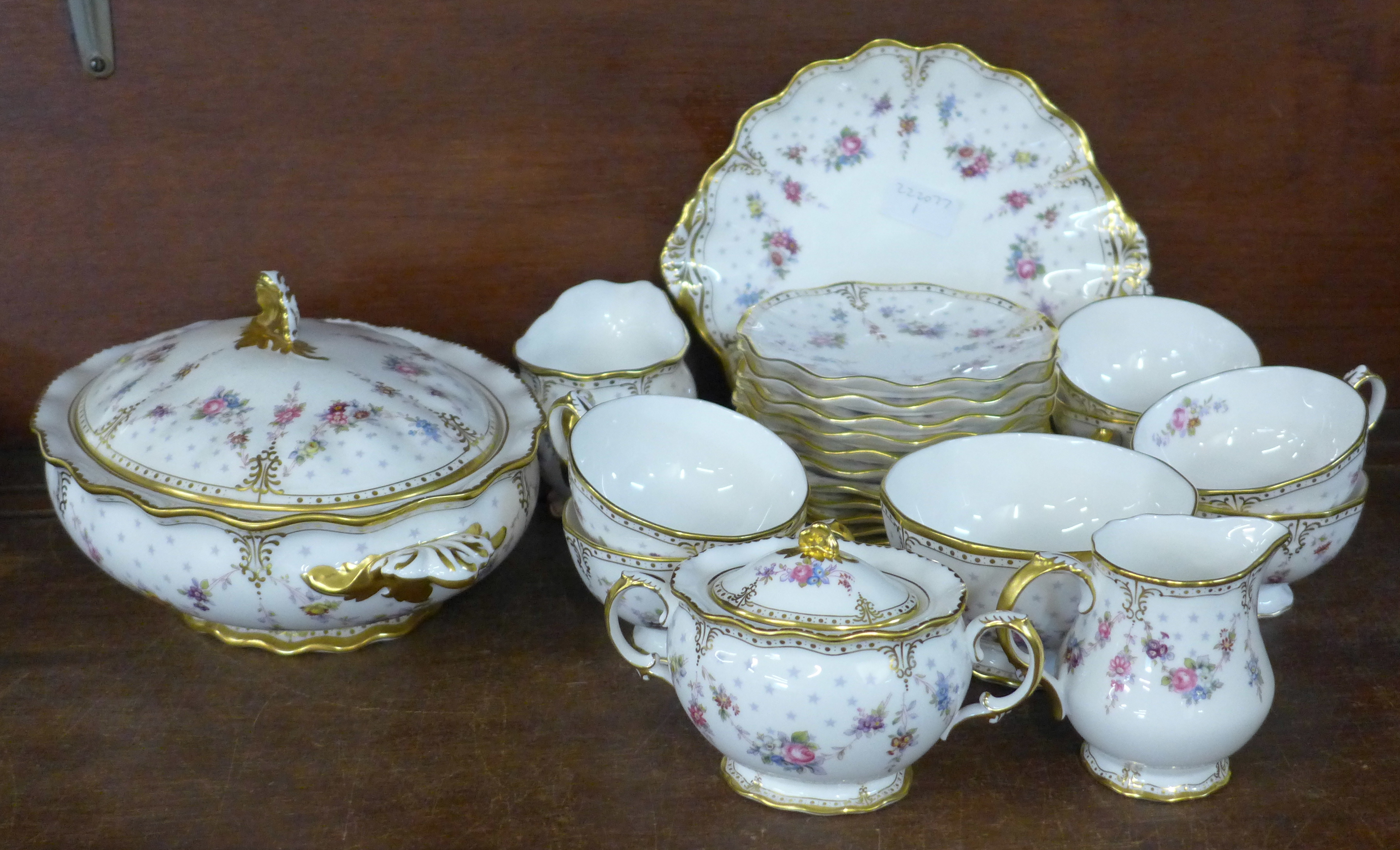 A Royal Crown Derby Antoinette tea set with oval tureen, 2 x cream and sugar and bread and butter