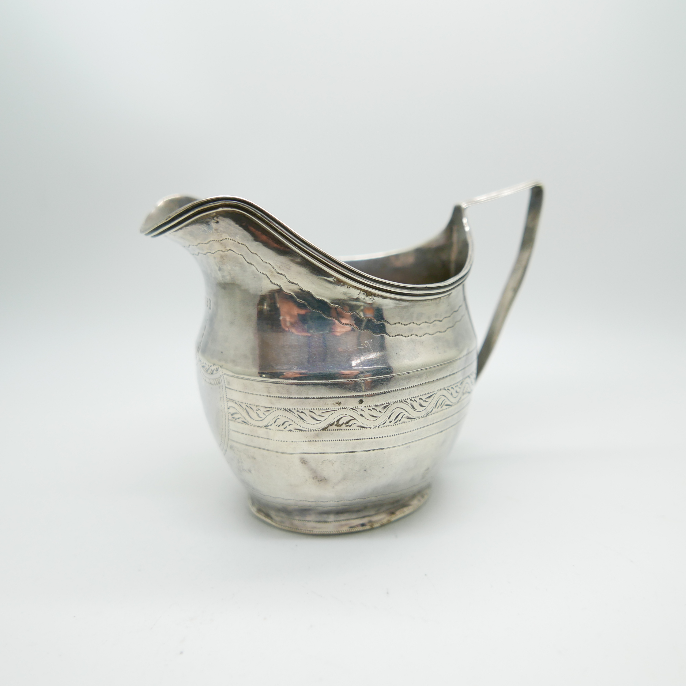 A George III silver cream jug, by John Merry, London 1805, 94.4g - Image 4 of 5